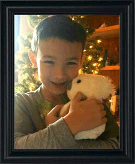 Cameron with Snowy the koala